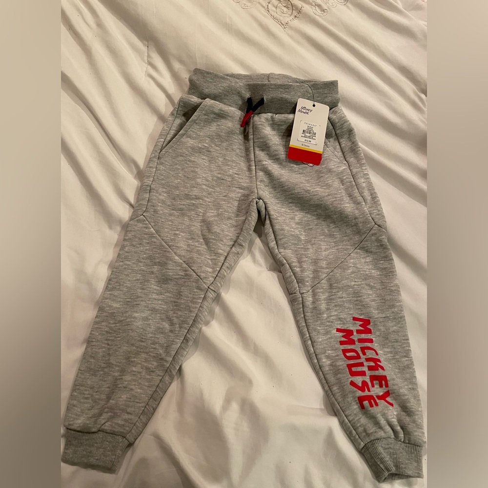 Mickey Mouse sweatpants from Disney by Primark. Size 2-3y. Never worn, still tag